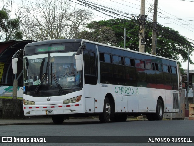 Transportes Charo 18 na cidade de Turrúcares, Alajuela, Alajuela, Costa Rica, por Alfonso Russell. Número da foto: #12840044.