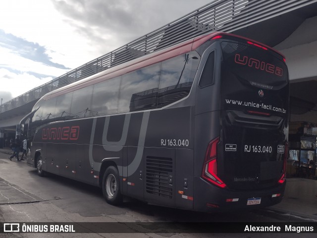 Transportes Única Petrópolis RJ 163.040 na cidade de Rio de Janeiro, Rio de Janeiro, Brasil, por Alexandre  Magnus. Número da foto: #12915813.
