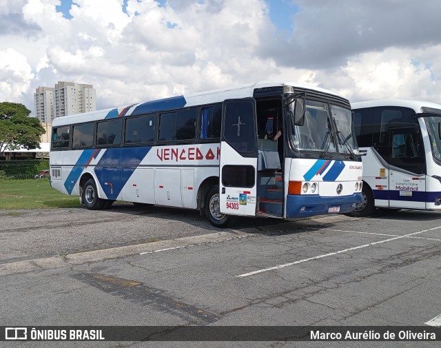 Ônibus Particulares 94303 na cidade de São Paulo, São Paulo, Brasil, por Marco Aurélio de Oliveira. Número da foto: #12990429.