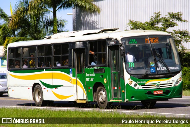 Transporte e Turismo Iluminada MG 1.067 na cidade de Magé, Rio de Janeiro, Brasil, por Paulo Henrique Pereira Borges. Número da foto: #13061888.