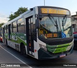 Transportes Flores RJ 128.210 na cidade de Duque de Caxias, Rio de Janeiro, Brasil, por Vitor Dasneves. Número da foto: #13091347.