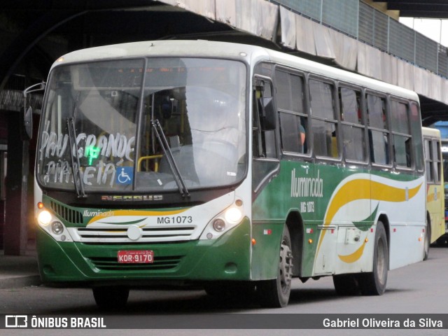 Transporte e Turismo Iluminada MG 1.073 na cidade de Magé, Rio de Janeiro, Brasil, por Gabriel Oliveira da Silva. Número da foto: #13157283.