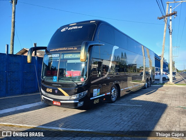 Trans Express 4545 na cidade de Tramandaí, Rio Grande do Sul, Brasil, por Thiago Capra. Número da foto: #13161344.