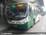 Transporte e Turismo Iluminada MG 1.023 na cidade de Magé, Rio de Janeiro, Brasil, por Jonas Alcantara. Número da foto: #13116364.