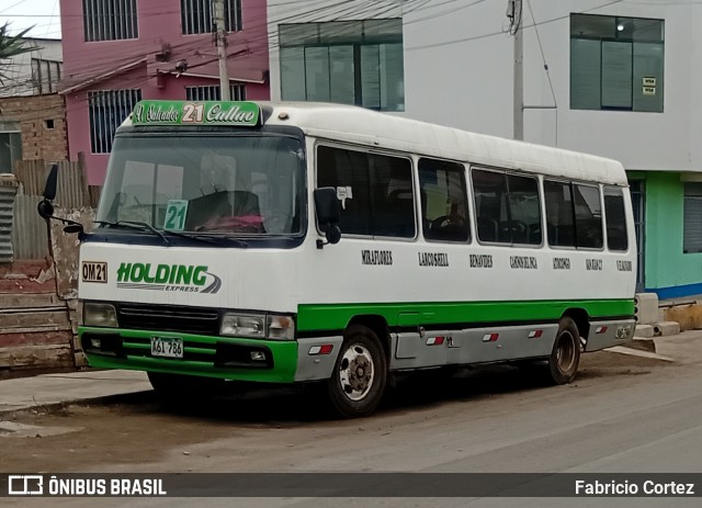 Holding Express A6I786 na cidade de Lurin, Lima, Lima Metropolitana, Peru, por Fabricio Cortez. Número da foto: #13232755.
